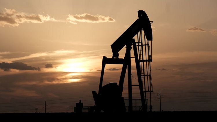 Oil slips on huge U.S. crude build; hopes for U.S.-China trade talks check losses