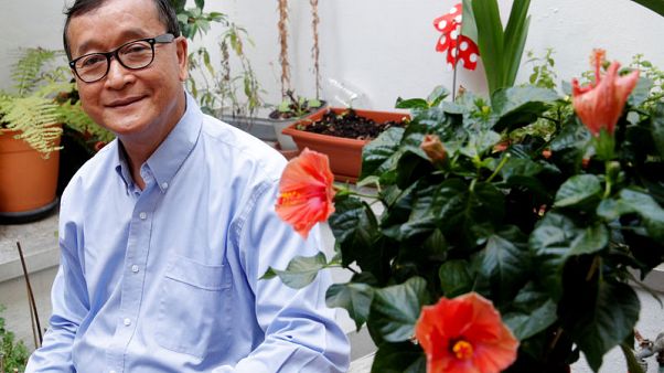 Facing arrest, Cambodia's Sam Rainsy vows he will return Saturday Facing arrest, Cambodia's Sam Rainsy vows he will return Saturday