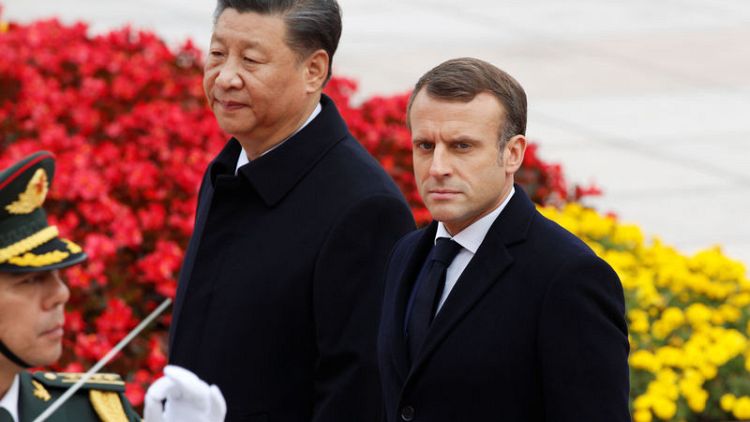 China and France sign deals worth $15 billion during Macron's visit