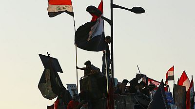 Iraqi security forces break up protests in Battle of the Bridges