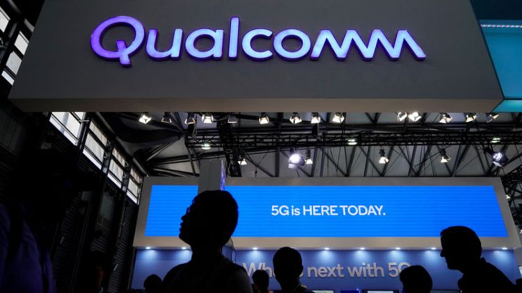 Qualcomm's licensing forecast, helped by Apple deal, drives share gains