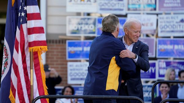 Former Obama officials rally behind Biden as he trails top rivals in money race Former Obama officials rally behind Biden as he trails top rivals in money race