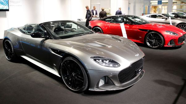 Aston Martin swings to third-quarter loss as volumes drop Aston Martin swings to third-quarter loss as volumes drop