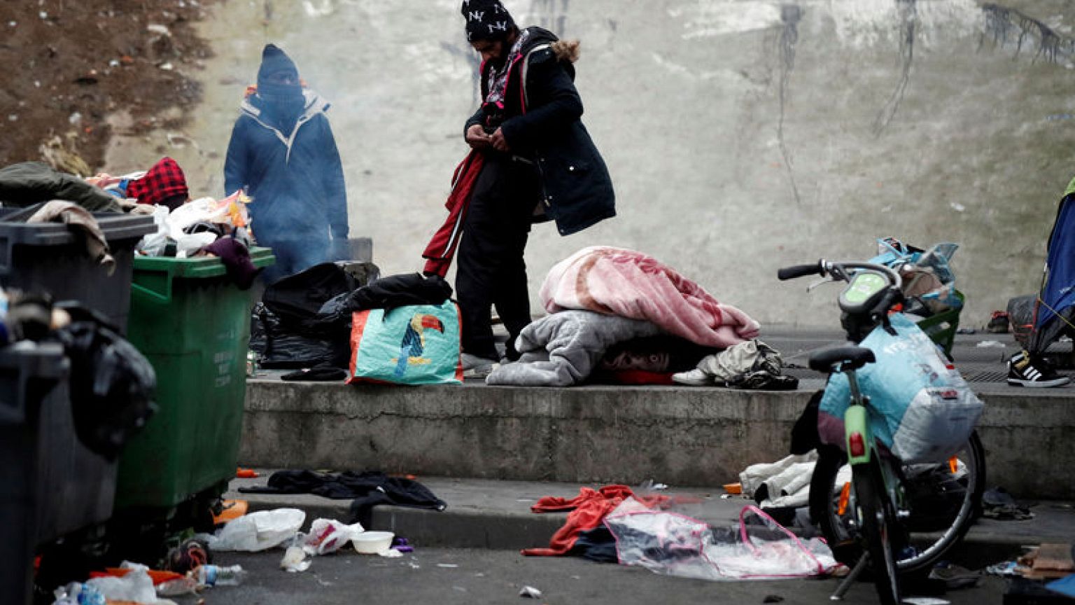 French police clear migrant tent camps in northern Paris