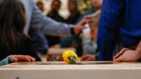Slain in Mexico, 7-month-old twins buried in rain-swept funeral Slain in Mexico, 7-month-old twins buried in rain-swept funeral