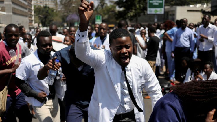 Zimbabwe fires 211 striking doctors as economy worsens