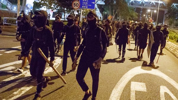 Thousands gather for 'martyrs' vigil amid Hong Kong protests Thousands gather for 'martyrs' vigil amid Hong Kong protests