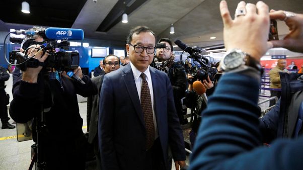 Cambodian opposition figure Sam Rainsy boards plane in Paris Cambodian opposition figure Sam Rainsy boards plane in Paris