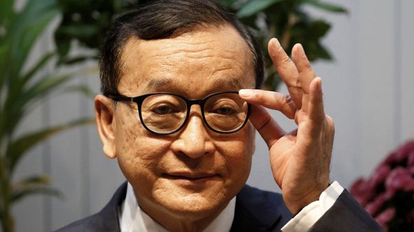 Cambodian opposition figure Sam Rainsy taken aside by Malaysian immigration officials Cambodian opposition figure Sam Rainsy taken aside by Malaysian immigration officials