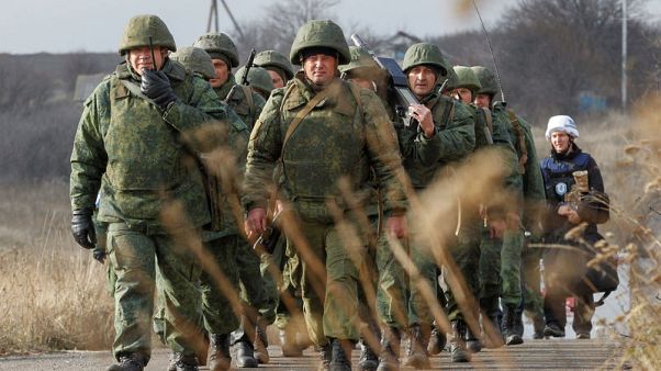 Ukraine, Russian-backed rebels begin Donbass village withdrawal Ukraine, Russian-backed rebels begin Donbass village withdrawal