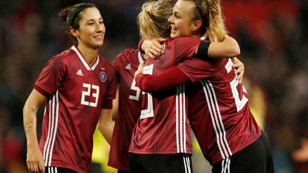 Germany win 2-1 as England women draw record crowd at Wembley Germany win 2-1 as England women draw record crowd at Wembley