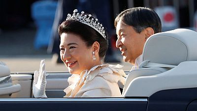 Japan imperial couple rides through Tokyo in grand enthronement parade Japan imperial couple rides through Tokyo in grand enthronement parade