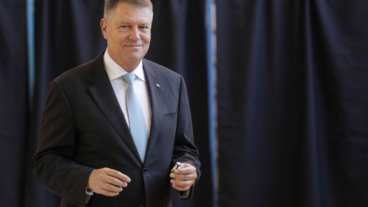 Romania's Iohannis wins presidential ballot, will face runoff