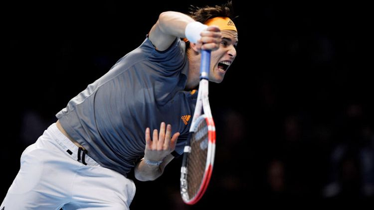 Thiem overpowers Federer in ATP Finals opener