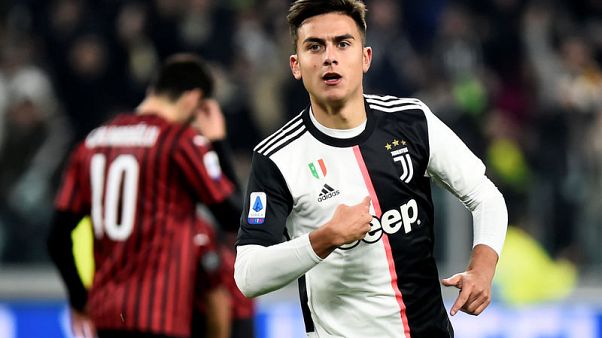 Juve's Dybala sinks Milan as unhappy Ronaldo substituted Juve's Dybala sinks Milan as unhappy Ronaldo substituted
