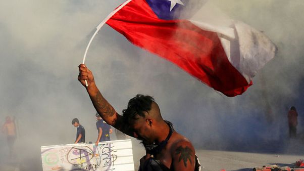 Chile to re-write Pinochet-era constitution in win for protesters Chile to re-write Pinochet-era constitution in win for protesters