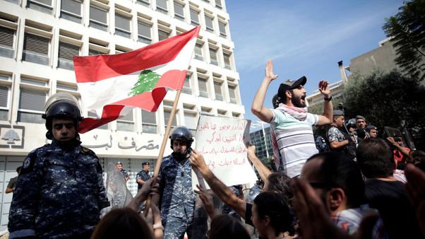 Lebanon central bank says bank deposits are safe, banks to review curbs Lebanon central bank says bank deposits are safe, banks to review curbs