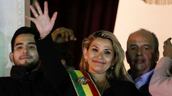 Bolivian Senate head assumes interim presidency; Morales' loyalists object Bolivian Senate head assumes interim presidency; Morales' loyalists object
