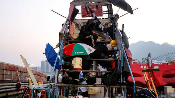 Protesters blockade universities, stockpile makeshift weapons as chaos grips Hong Kong Protesters blockade universities, stockpile makeshift weapons as chaos grips Hong Kong