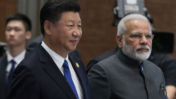 Despite Kashmir anger, China's Xi invites India's Modi to visit again next year Despite Kashmir anger, China's Xi invites India's Modi to visit again next year