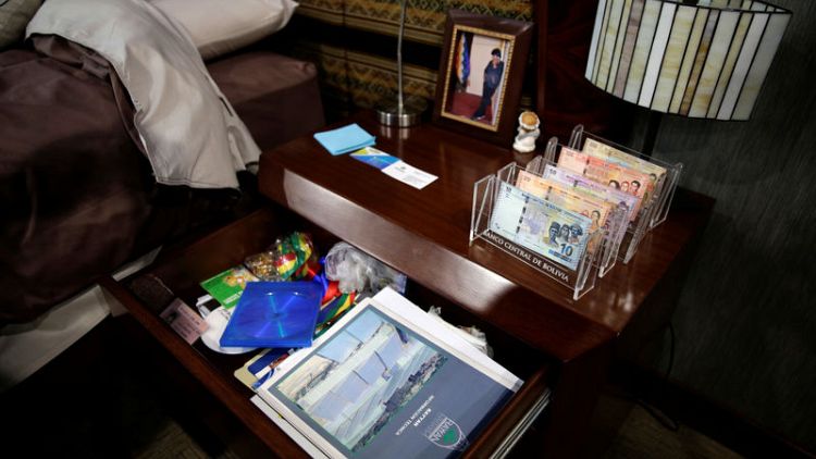 Andean textiles and bank bills: Inside Morales' home at Bolivia's Big House of the People