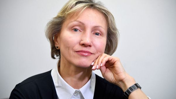 Widow of ex-KGB agent plans legal action on UK's Russia report Widow of ex-KGB agent plans legal action on UK's Russia report