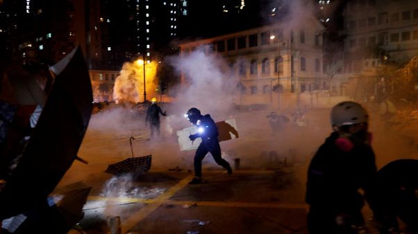 Chinese soldiers help clean up Hong Kong streets, but violence flares again Chinese soldiers help clean up Hong Kong streets, but violence flares again