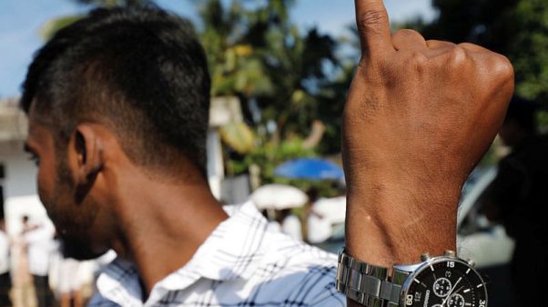 Sri Lankans vote for a new president to heal divisions after Easter attack Sri Lankans vote for a new president to heal divisions after Easter attack