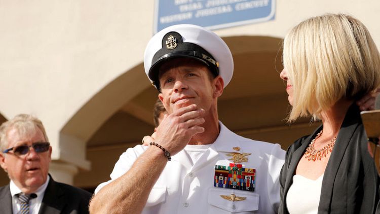 Trump pardons Army officers, restores Navy SEAL's rank in war crimes cases