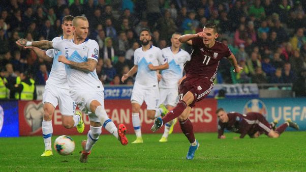 Own goal keeps Slovenia's faint hopes alive Own goal keeps Slovenia's faint hopes alive