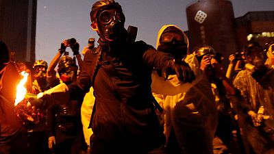 Hong Kong campus protesters fire arrows as anti-government unrest spreads