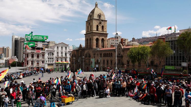 Bolivians queue for chicken and fuel as protests cripple highways