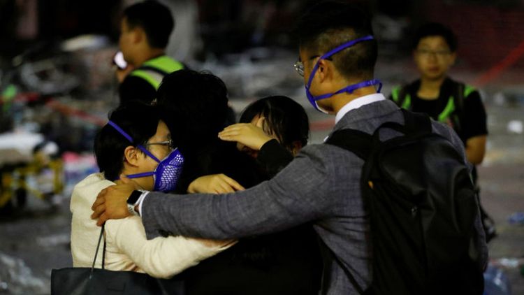 At embattled Hong Kong university, a dramatic escape