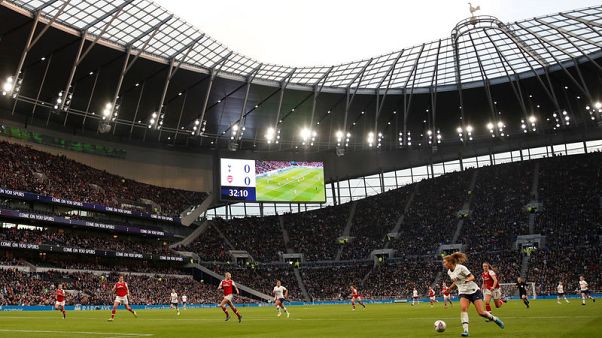 Record crowd sees Arsenal beat Spurs 2-0 in WSL derby Record crowd sees Arsenal beat Spurs 2-0 in WSL derby