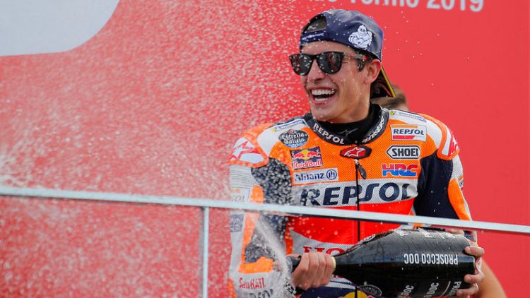 Motorcycling: Marquez triumphs in Valencia to give Honda triple crown