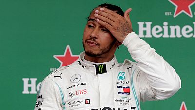 Hamilton apologises to Albon after rare error