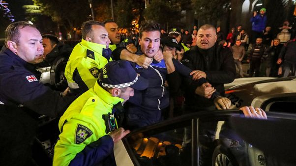 Police in Georgia detain protesters demanding early election Police in Georgia detain protesters demanding early election