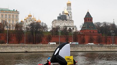 Russia detains activists after giant blow-up whale protest near Kremlin Russia detains activists after giant blow-up whale protest near Kremlin