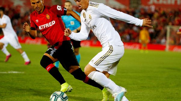 Real Madrid's Rodriguez set for spell out with knee injury Real Madrid's Rodriguez set for spell out with knee injury