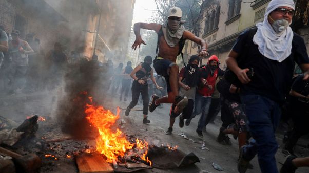 With stores burned and looted, Walmart seeks police protection in riot-hit Chile With stores burned and looted, Walmart seeks police protection in riot-hit Chile