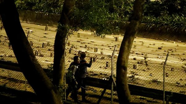 Hong Kong campus holdouts desperately seek escape routes Hong Kong campus holdouts desperately seek escape routes