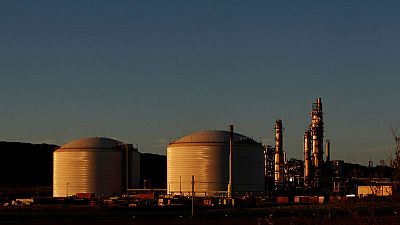 Australia's Woodside sees reserve base tripling as new projects progress Australia's Woodside sees reserve base tripling as new projects progress