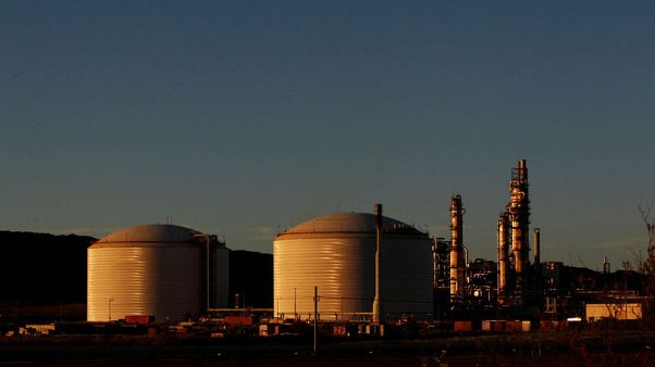 Australia's Woodside sees reserve base tripling as new projects progress Australia's Woodside sees reserve base tripling as new projects progress