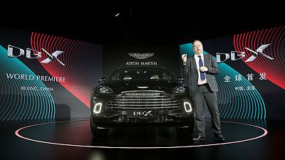 Aston Martin launches first SUV, hopeful of a turnaround