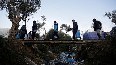 Struggling with influx, Greece gets tough with asylum seekers