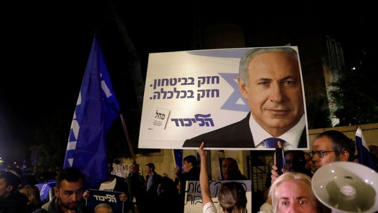 Netanyahu charged in corruption cases, deepening Israeli political disarray