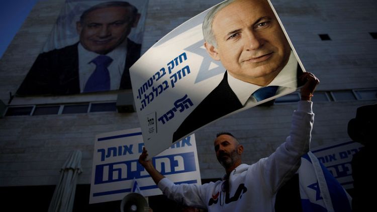 Israel's Netanyahu faces calls to quit but is defiant in crisis