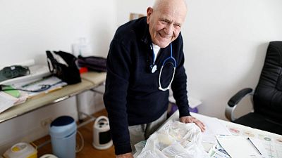 French doctor still treating patients at 98