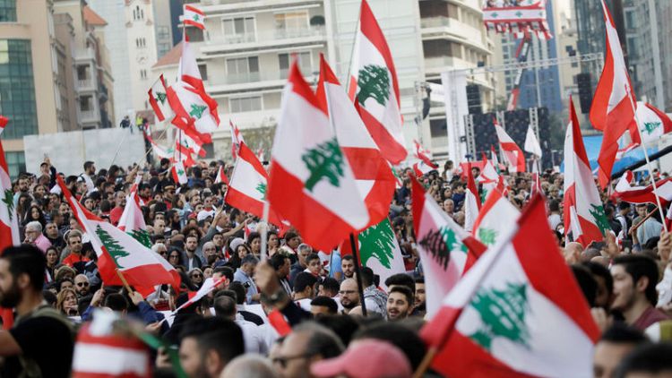 Lebanese protesters pack streets to mark independence day