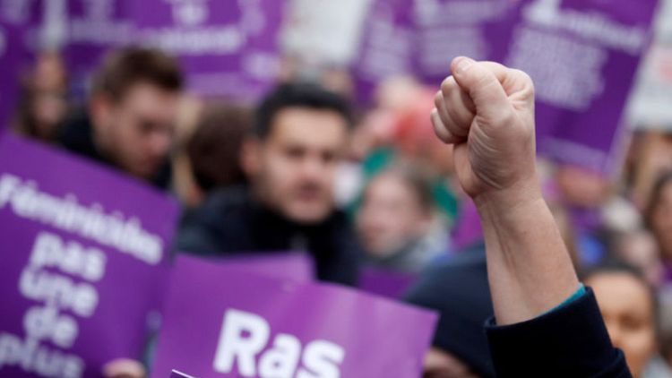 Tens of thousands march in France to condemn domestic violence